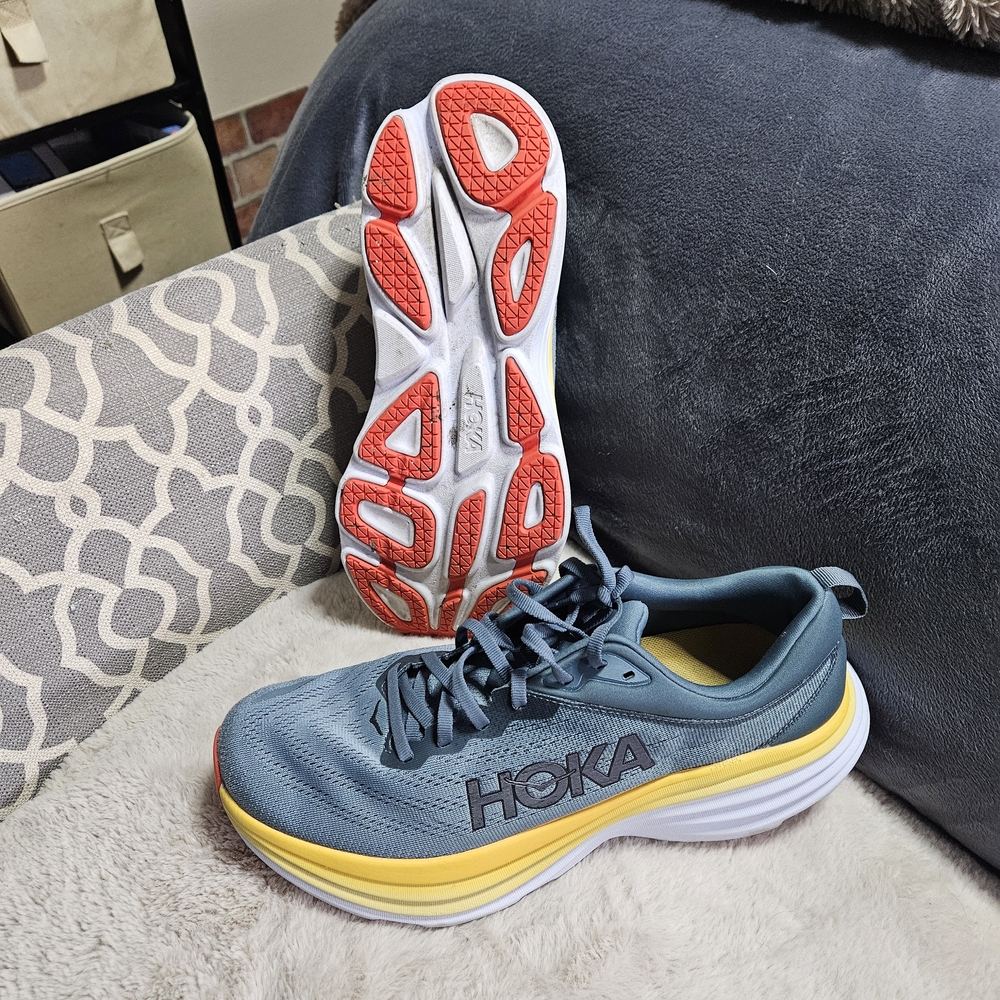 Hoka Women's Blue Running Shoes with Yellow and Red Accents